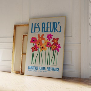 Retro floral poster with bright multi-color flowers and French text 'LES FLEURS'