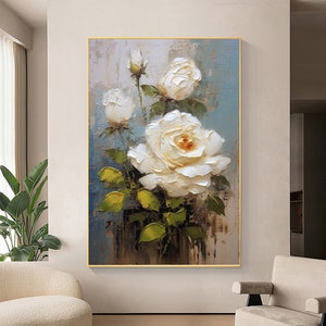 Framed canvas oil painting of white roses with green leaves and blue-gray tones