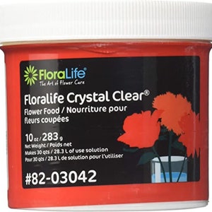 Floralife Crystal Clear flower food powder tub with white lid, red label