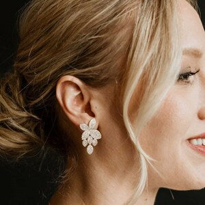 Gold crystal flower petal stud earrings with clustered petals