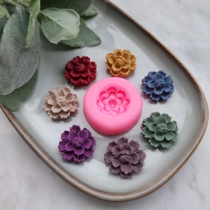 Pink silicone flower earring mold with six flower earring shapes
