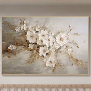 Framed canvas floral wall art with white blossoms on neutral beige and gray background