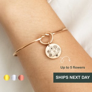 Gold-tone birth flower bracelet with round charm and botanical engraving