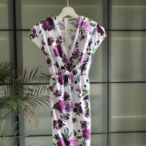 Purple floral wrap nursing dress with V-neck and short sleeves, soft jersey knit