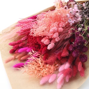 Pink dried flower bouquet with mixed textured blooms and long stems