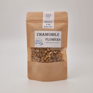 Dried chamomile flowers in stand-up paper pouch, labeled herb pack