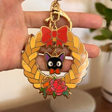 Jiji from Kiki's Delivery Service with Braided Bread and Flowers Keychain or Pin | Ghibli Fanart | Charms | Hard Enamel | Gift for Teen