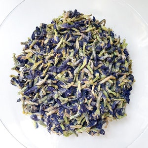 Dried butterfly pea flowers with blue and pale petals
