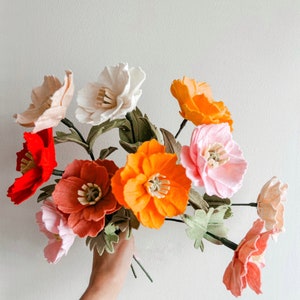 Felt flower stem bouquet with orange, pink, red, and white blooms