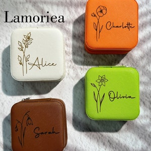 Engraved birth flower jewelry box set with name/flower on white, orange, green, and brown cases