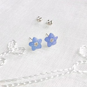 Blue pressed-flower stud earrings with sterling silver posts