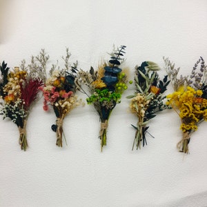 Small dried flower posies with mixed blooms in rustic tabletop bouquet set