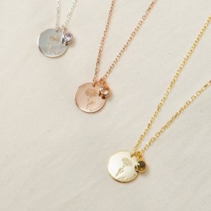 Birth flower birthstone necklace with round pendant and small floral charm, gold tone