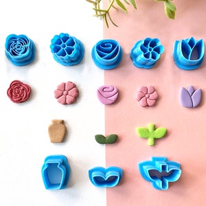 Floral polymer clay cutter set with embossed flower shapes in blue and pink