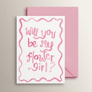 Pink proposal card with pink squiggle border and text: 'Will you be my flower girl?'