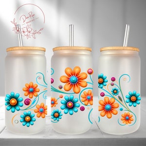 Frosted glass tumbler cups with colorful retro flower wrap and straws