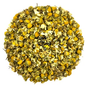 Loose dried chamomile flower buds and heads, yellow and white, for herbal tea