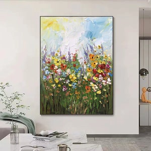 Large abstract flower oil painting in a black frame, colorful blooms on green stems