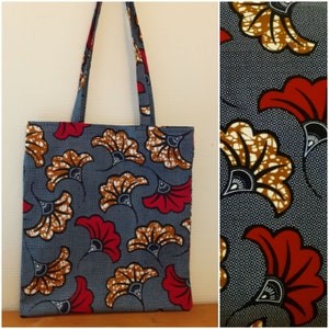 Navy tote bag with colorful batik floral pattern and fabric handles