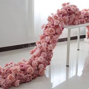 Dusty rose flower garland with layered rose blossoms, curved for arch styling