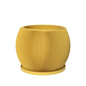Yellow ribbed planter pot with drainage and saucer, melon-style design