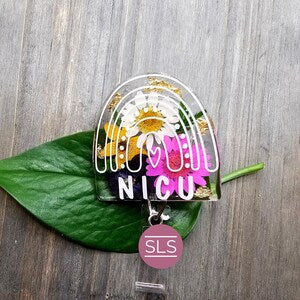 NICU badge reel with rainbow arch design and colorful NICU lettering