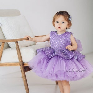 Lavender sequined first birthday dress with tulle skirt and bow waist, sleeveless