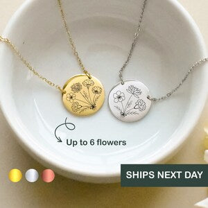 Dual-heart flower necklace with gold and silver pendants on a fine chain