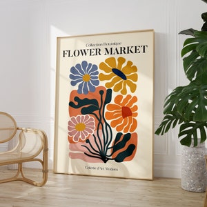 Framed flower market watercolor art print with pastel blue, yellow, and orange blooms