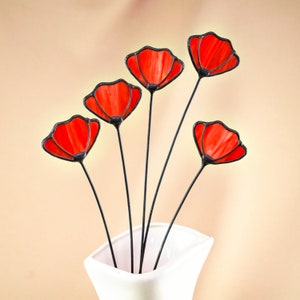 Stained glass red flower stems in a white pot, single branch with five blooms