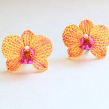 Yellow orchid flower earrings with pink centers and orange speckles