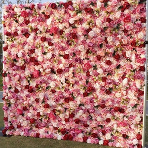 Artificial rose flower panel backdrop with dense pink and burgundy blooms