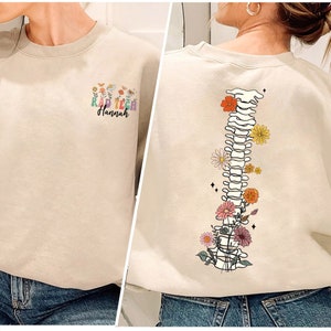 Personalized radiology technologist T-shirt with spine x-ray and floral graphic