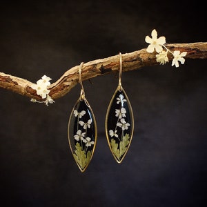 Botanical leaf drop earrings with small pressed flowers