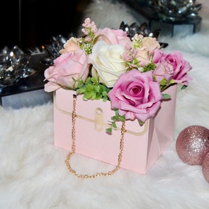 Pink flower purse gift box with faux roses and gold chain handles for vanity decor