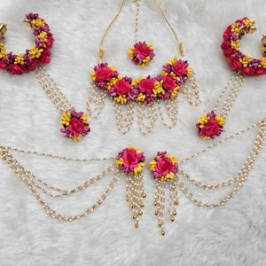 Floral jewelry set with pink and yellow blooms, gold-tone chain necklace and matching earrings