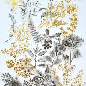 Semi-transparent botanical stickers with gold and gray leaf and flower designs
