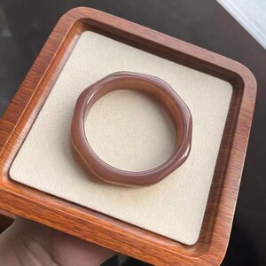 Purple translucent jadeite bangle bracelet with smooth curved surface