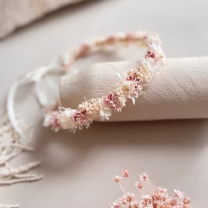 Newborn flower head wreath with cream tulle ribbon and small pink dried blossoms
