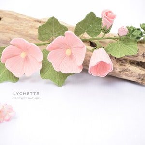 Crochet hollyhock flowers with pink petals and green leaves, 3-piece set