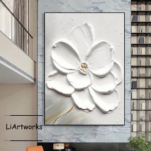 3D floral relief canvas wall art with raised white flower petals and gold center