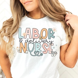 White labor & delivery nurse T-shirt with colorful heart-and-stethoscope print