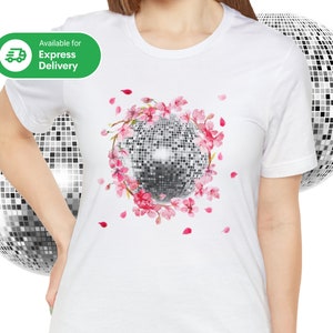 White dance T-shirt with glittery disco ball graphic and pink flower accents