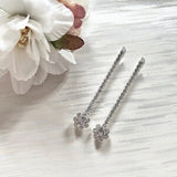 Set of 2 silver rhinestone hair clips with glittery flower centers