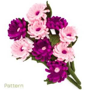 Crochet asters flower bouquet with pink and dark purple blooms and green leaves