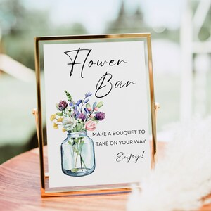 Flower bar sign with floral bouquet in vase and Flower Bar script