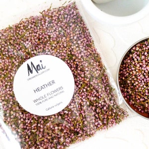 Whole dried heather flower buds in small purple and pink clusters