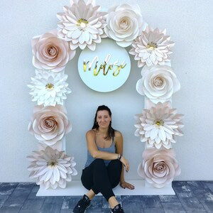 Large white and blush paper flower wall decor wreath with layered blooms