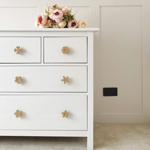 Flower drawer knobs, gold floral handles on white dresser drawers
