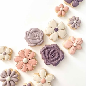 Flower-shaped cookie cutter set with rose, daisy, and five-petal designs